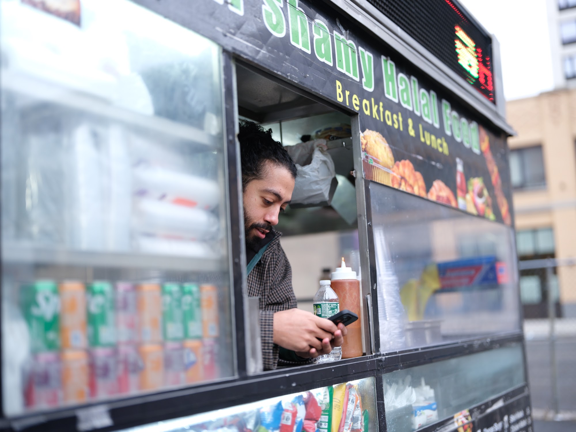 Crew working around the halal cart between setups