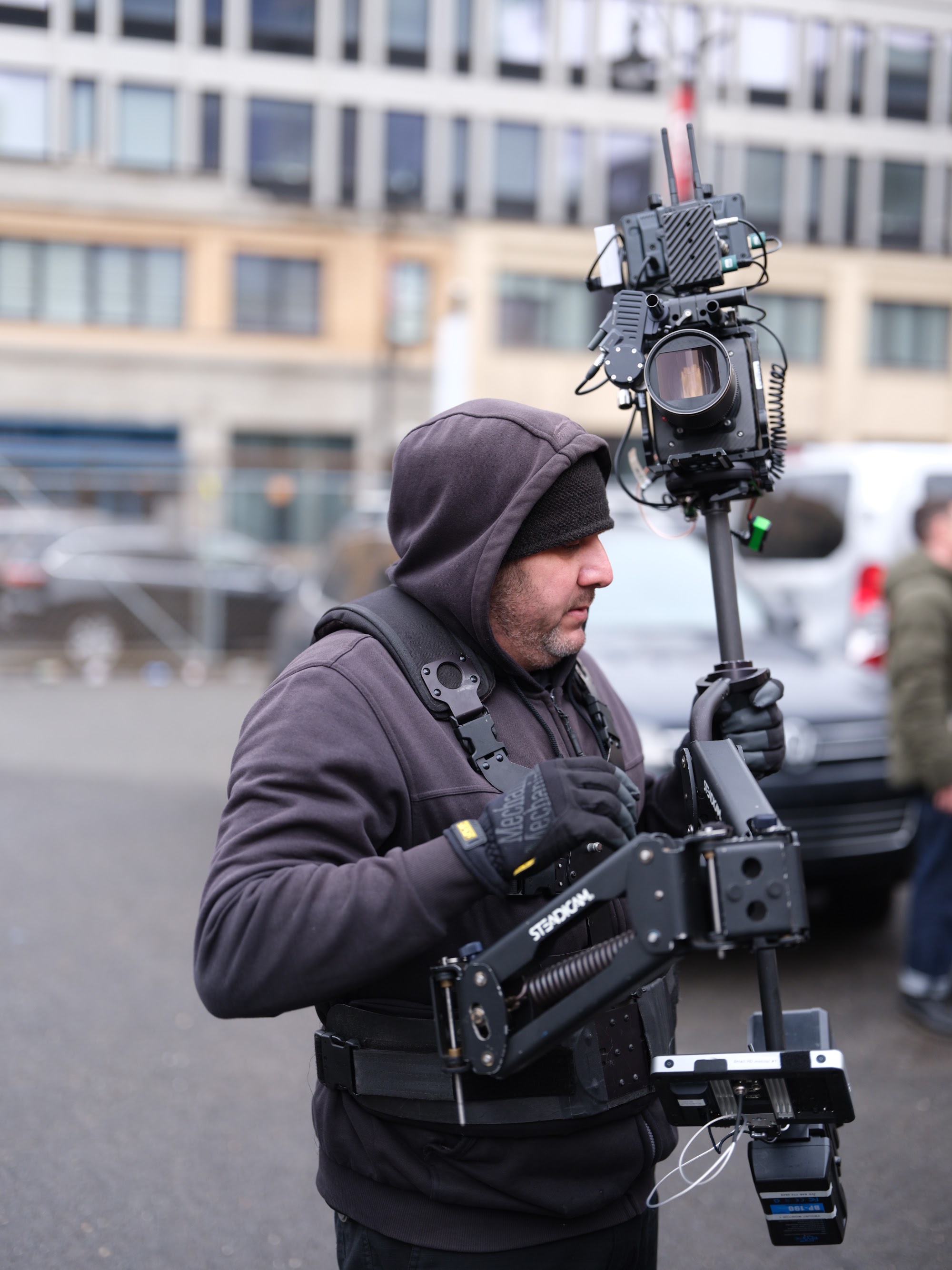 Steadicam operator working the street